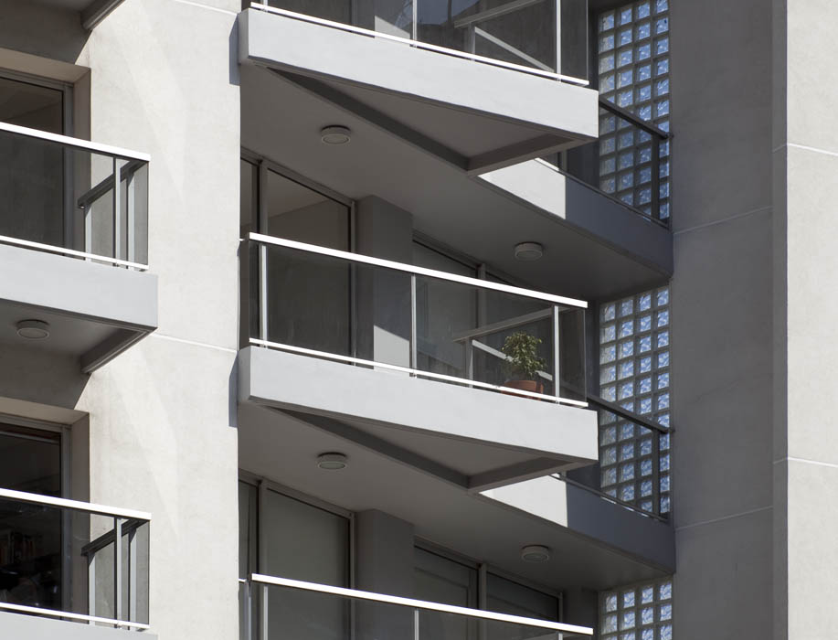 a building with windows and balconies