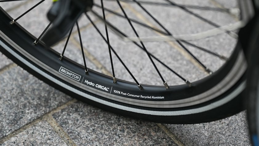 a bicycle tire on a sidewalk