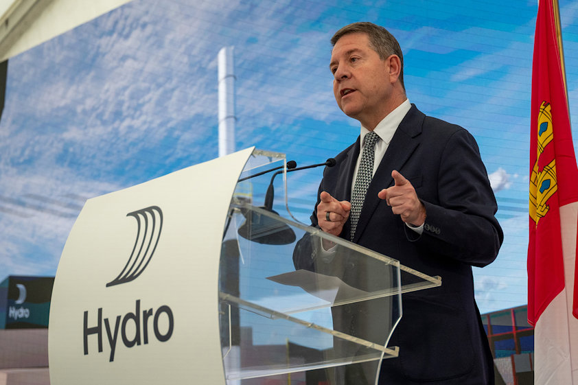 a man speaking at a podium