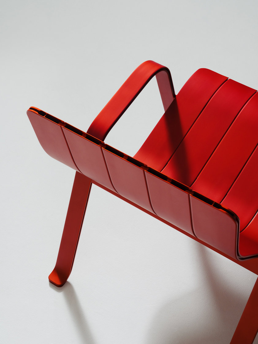 A red aluminium chair